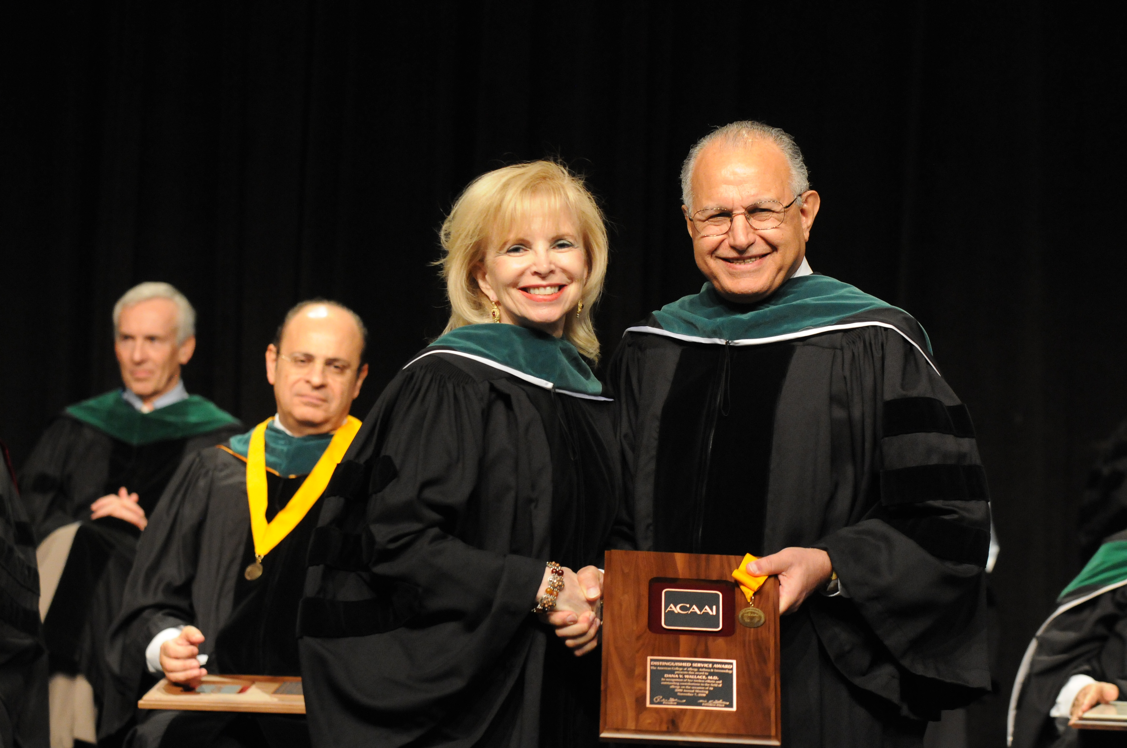 Dana Wallace receiving the ACAAI Distinguished Service Award
