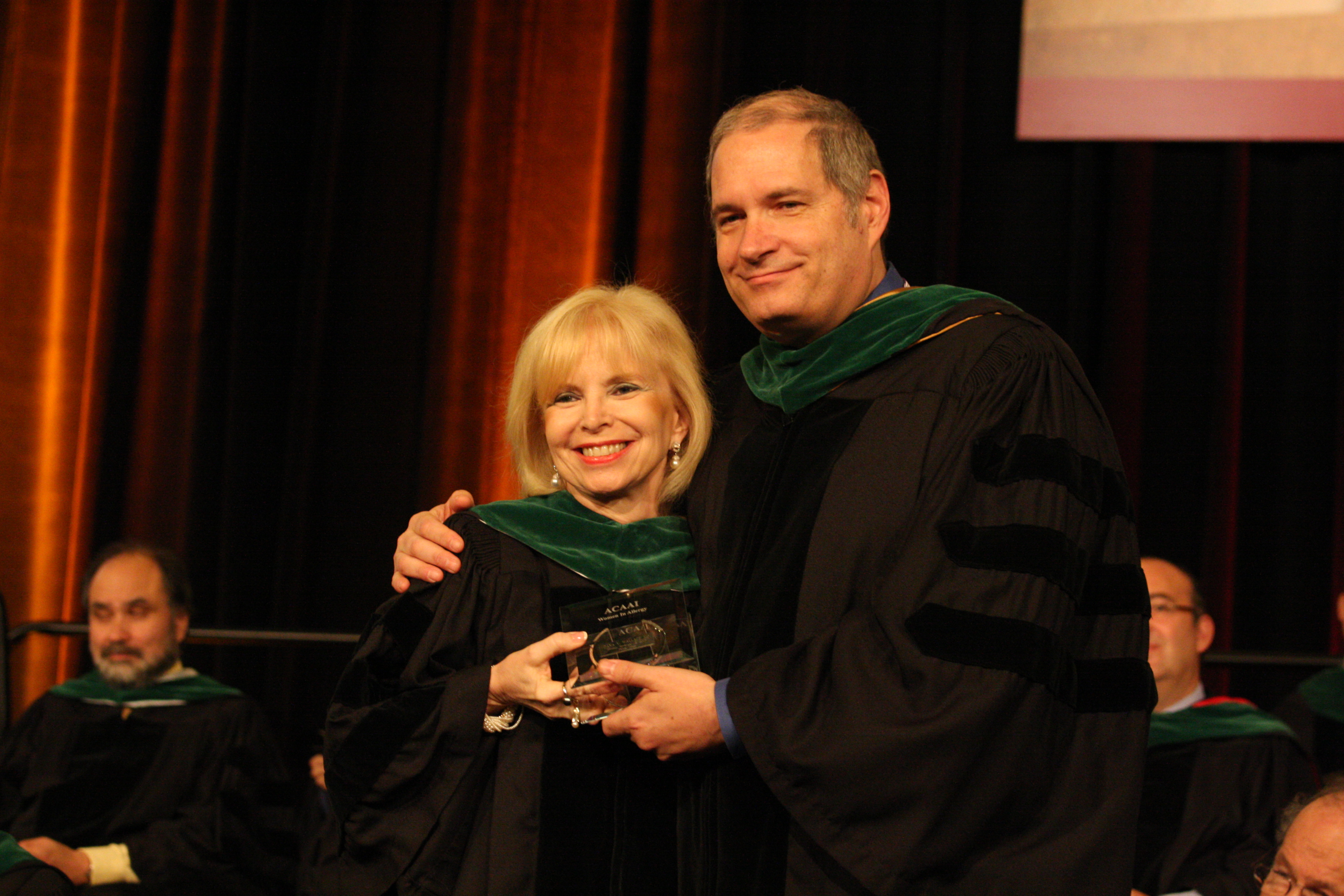 Dana Wallace receiving the ACAAI Woman in Allergy Award